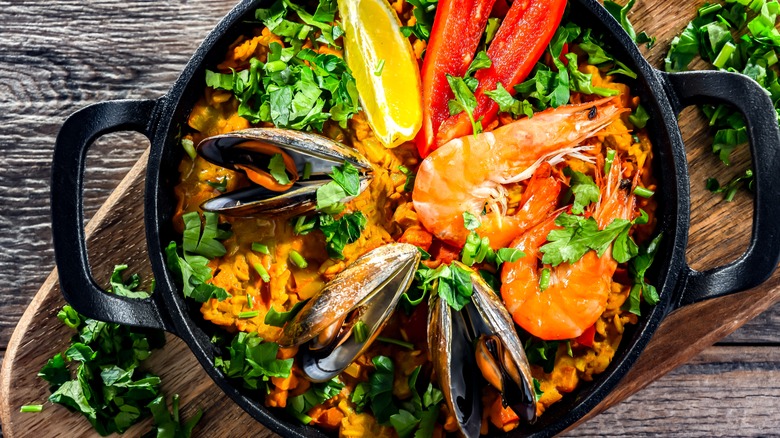 shrimp and mussel paella made in a cast iron pan
