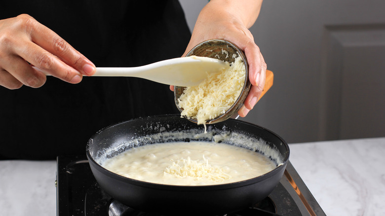 Adding cheese to a pan sauce