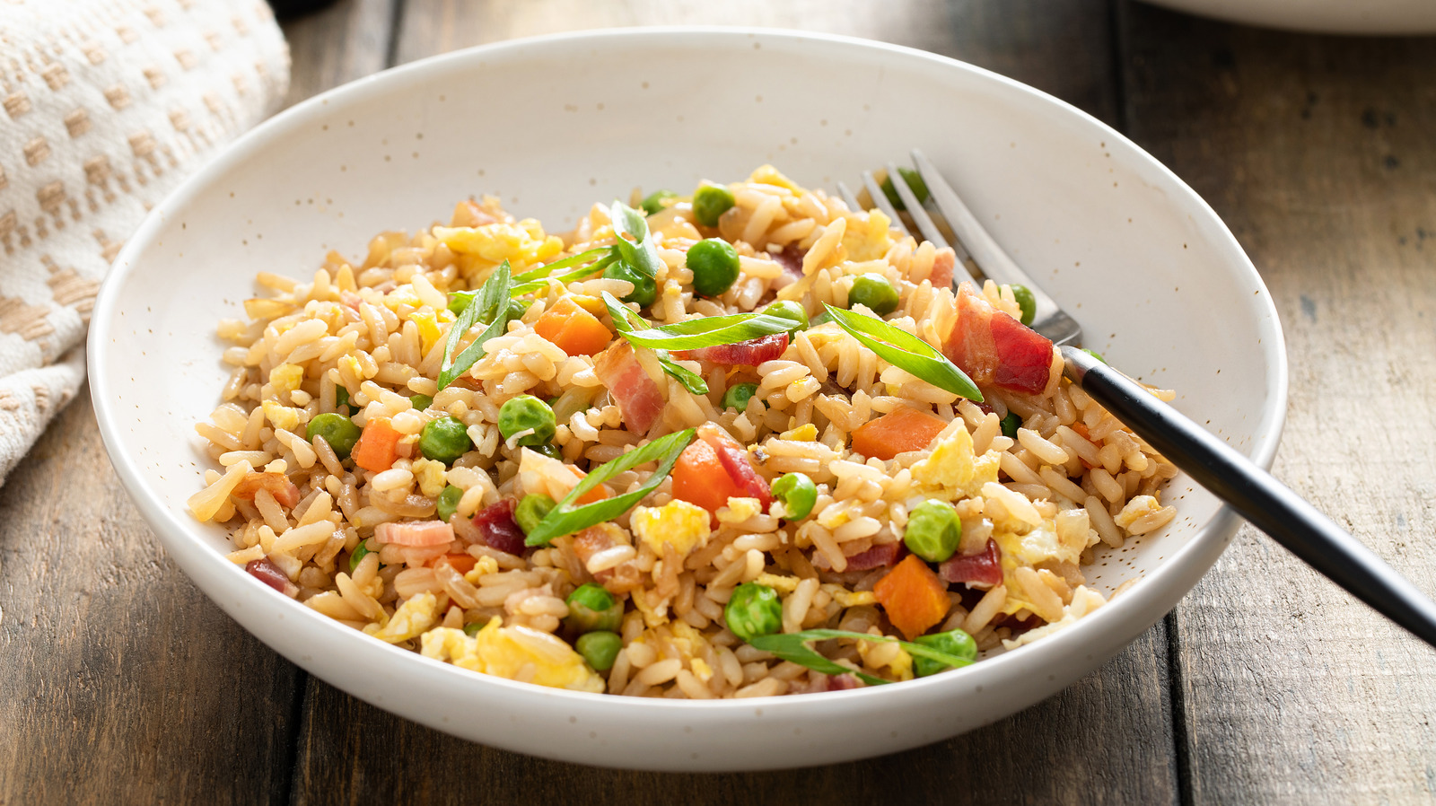 https://www.foodrepublic.com/img/gallery/delicious-ingredients-that-will-upgrade-your-fried-rice/l-intro-1702740463.jpg