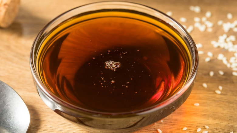 Glass bowl of sesame oil