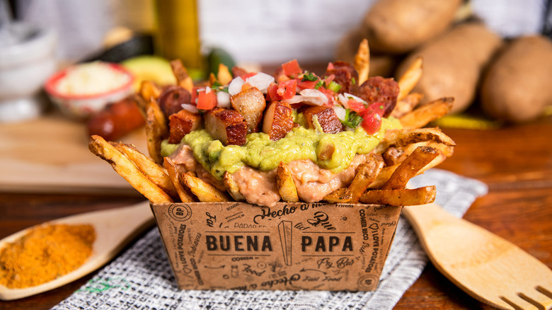 Buena Papa loaded fries with wooden cutlery