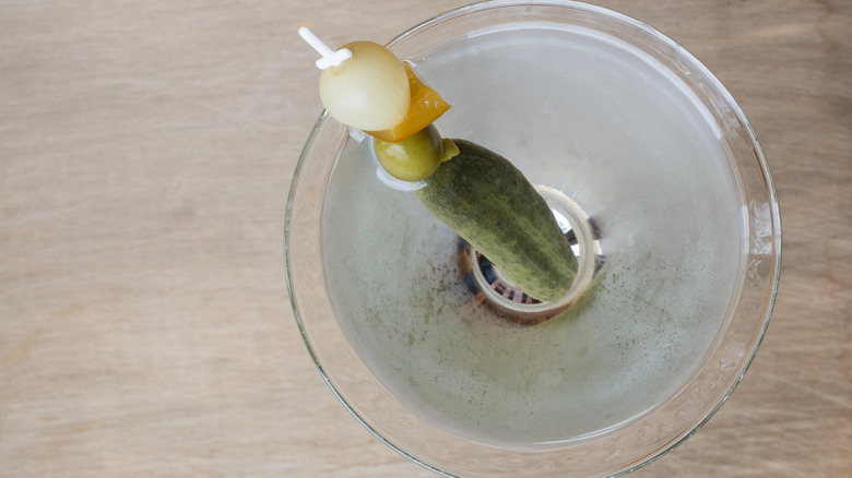 martini glass with various garnishes