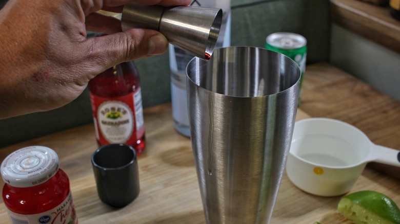 liquid pouring into shaker