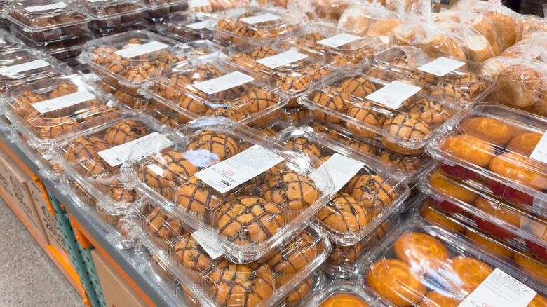 Containers of Costco baked goods sit in the bakery section of a Costco warehouse