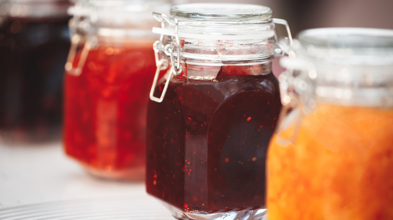 Jars of jelly in a row