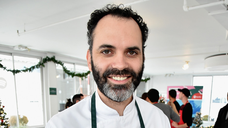 Pastry chef Dominique Ansel smiling at an event