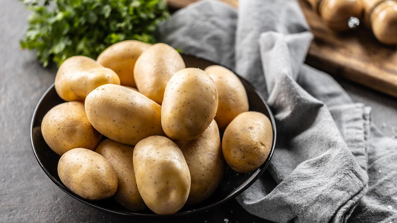 Bowl of freshly washed potatoes