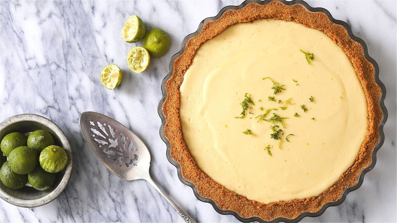 Key lime pie with serving spoon