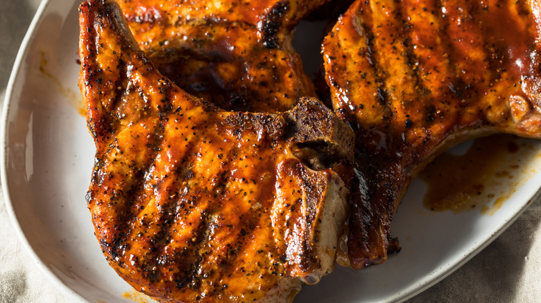 barbecue pork chops on a plate