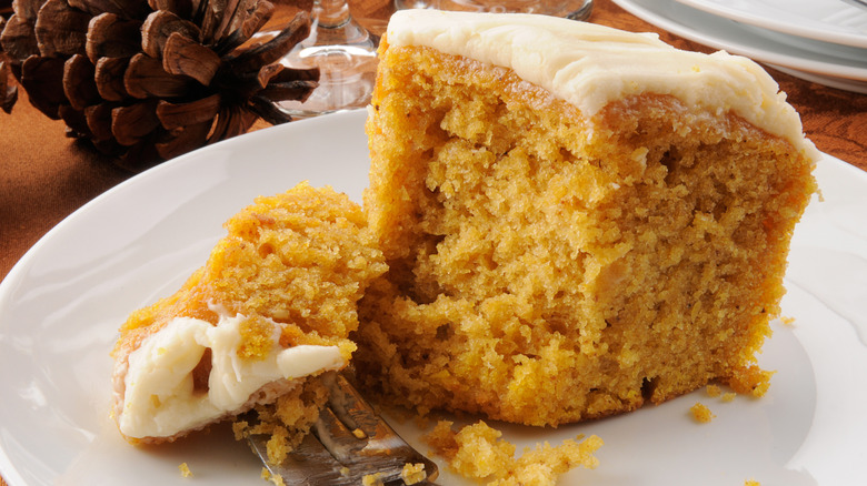 Slice of pumpkin cake with pine cone