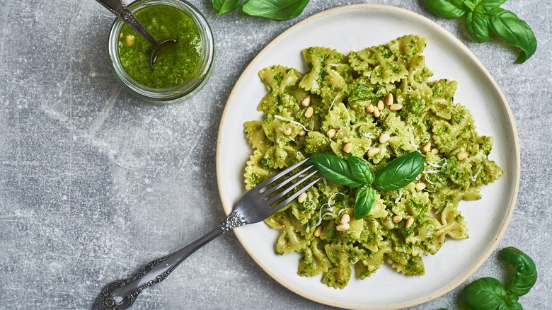 Overhead view of pesto pasta on a plate
