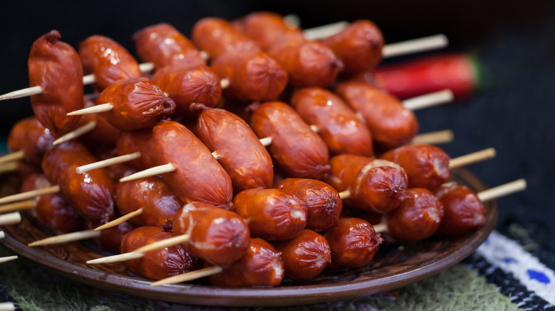 skewered hot dogs on plate