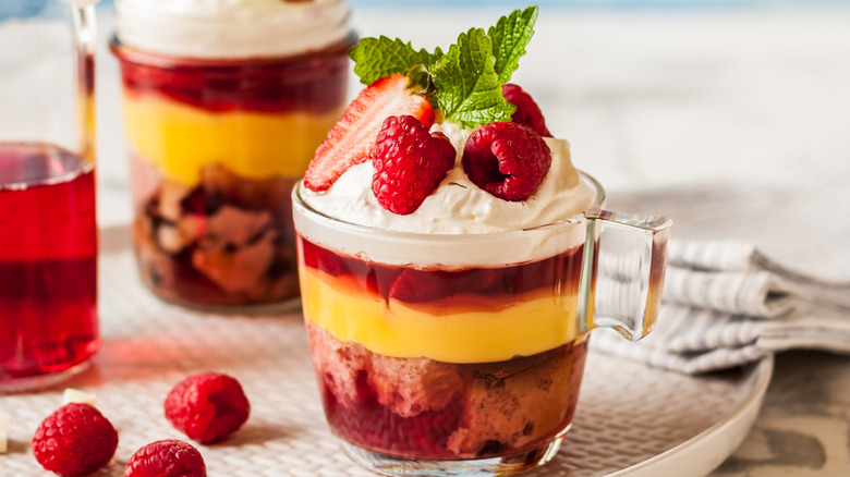 Lemon curd trifle with berries in glass