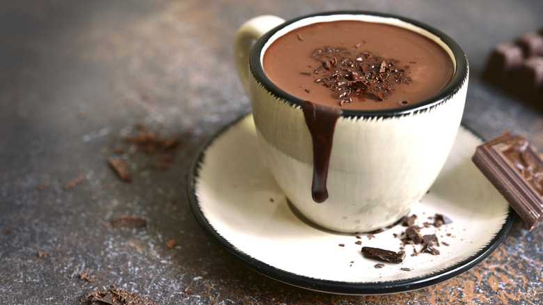 Thick hot chocolate in white mug