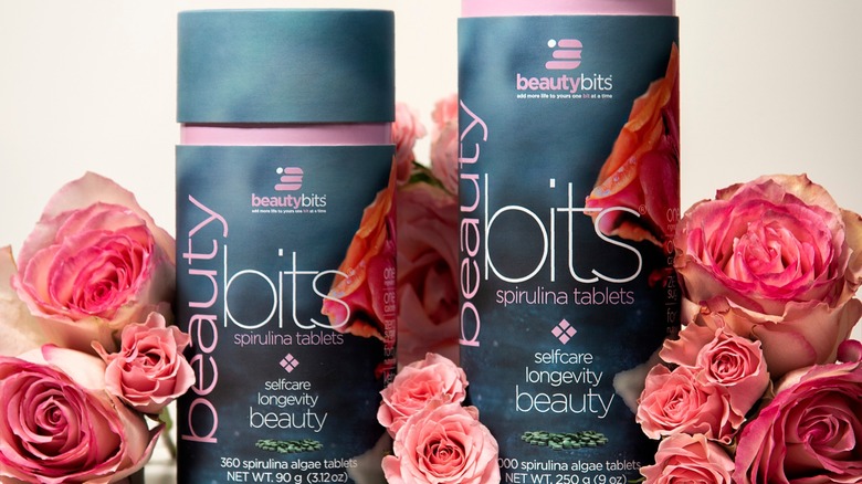 Canisters of Beautybits algae tablets