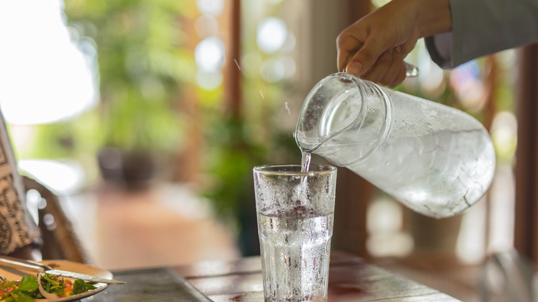 water being poured into glass