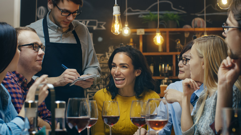 server taking food order