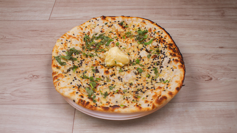 Naan with butter and nigella seeds