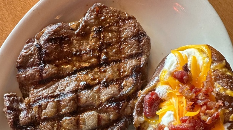 steak and loaded potato