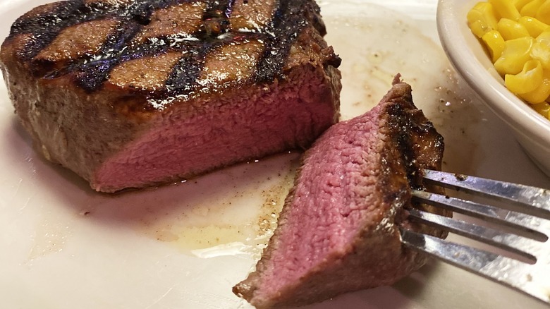 Fork with sliced steak