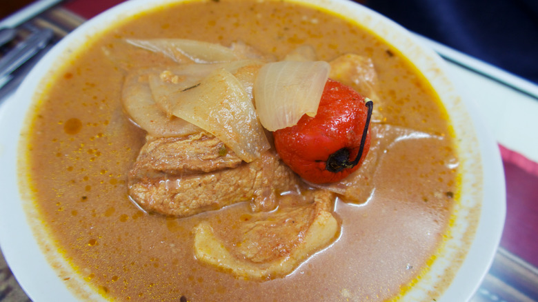 Peruvian adobo in a white bowl