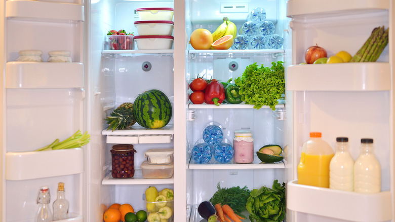 open fridge full of produce