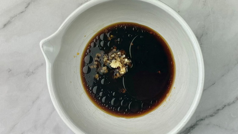 soy sauce in white bowl