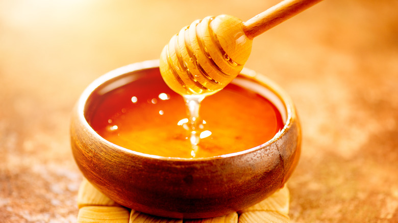 wooden bowl of honey