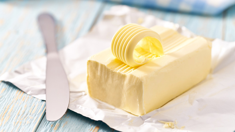 block of butter with knife
