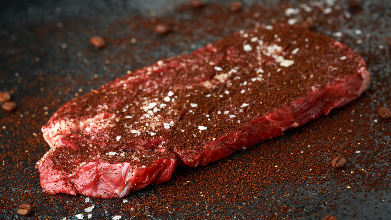 Raw steak with coffee rub