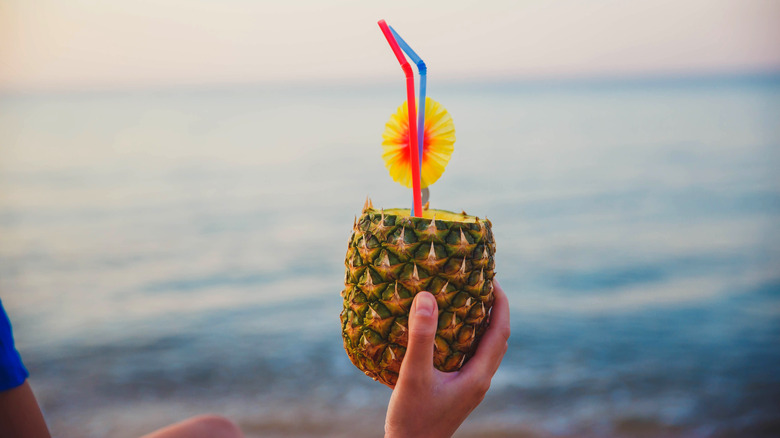 cocktail served in a pineapple