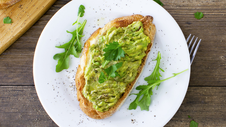 Avocado toast with fresh greens