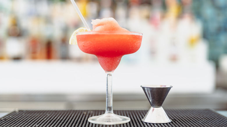 Frozen fruity margarita on a bar