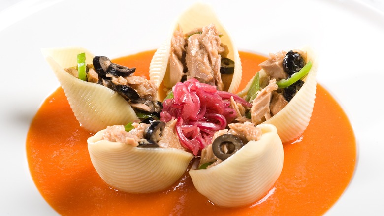 Congelli pasta shells stuffed with canned chunk tuna and olives in red sauce