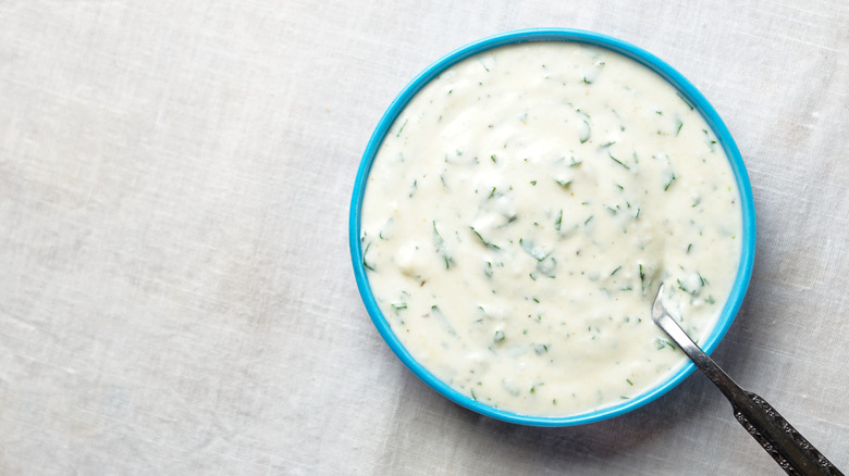 A bowl of homemade ranch dressing.