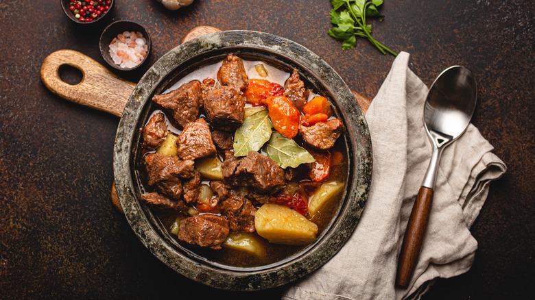 slow cooked beef surrounded by ingredients