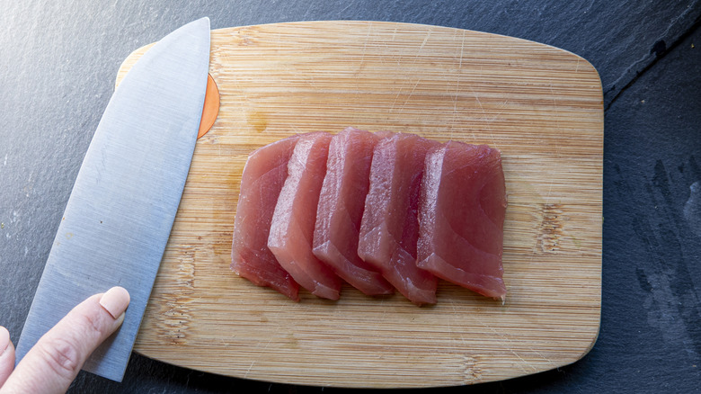 Raw tuna on a chopping board