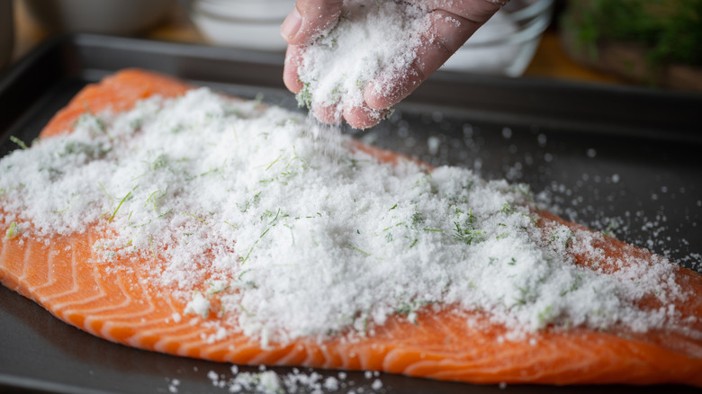 Salmon being cured with sugar