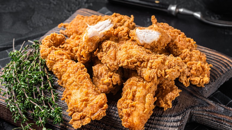 Fried chicken tenders with rosemary