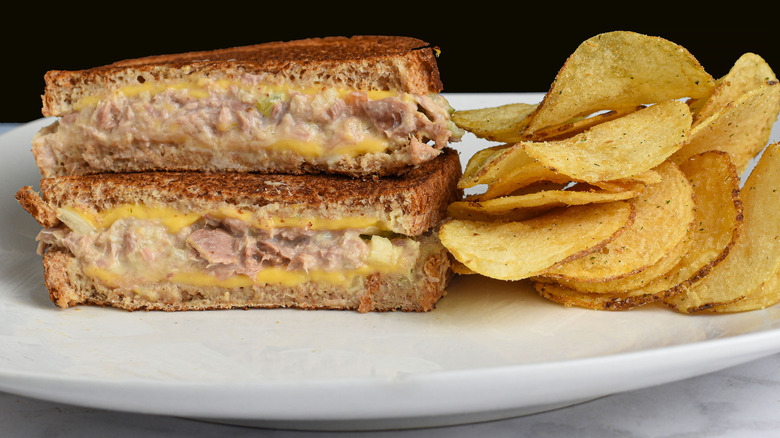 Tuna melt sandwich with potato chips