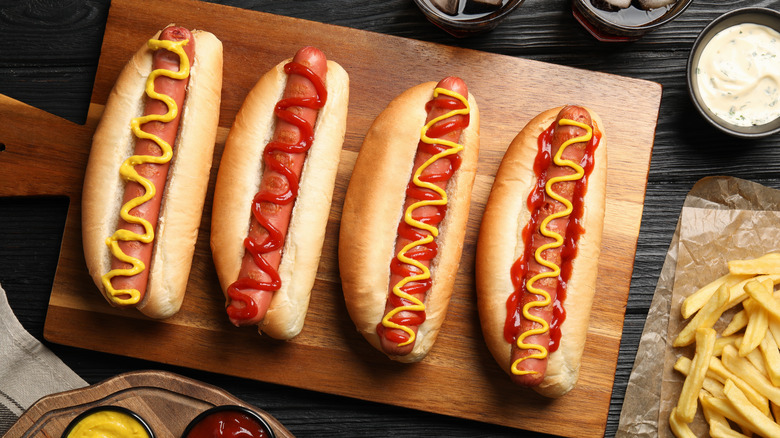 hot dogs on cutting board