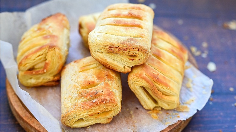 Puff pastry hand pies on parchment