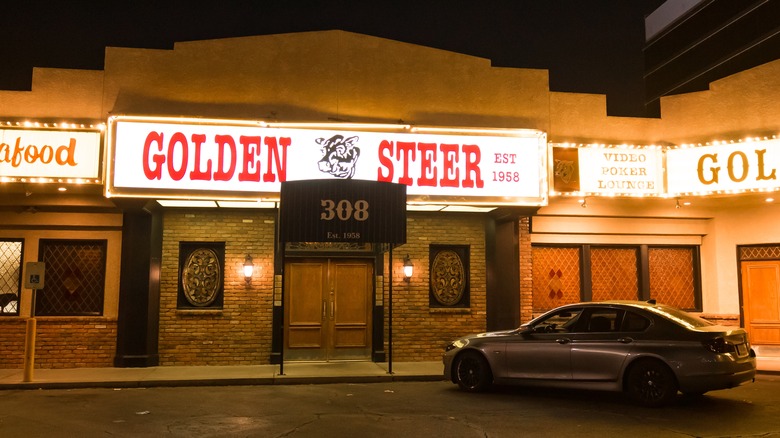 The entrance of the Golden Steer with neon sign