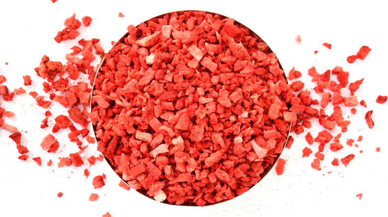 Bowl of crushed freeze dried strawberries