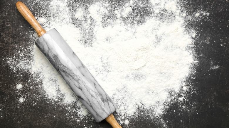 Marble rolling pin on flour