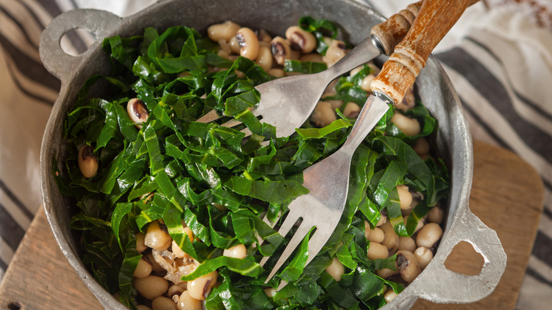 Pot of black eyed peas and collard greens