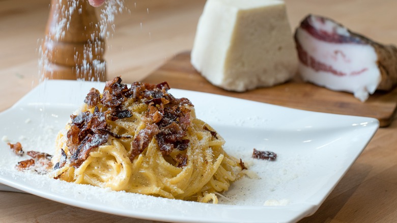 Plate of bucatini pasta with pancetta
