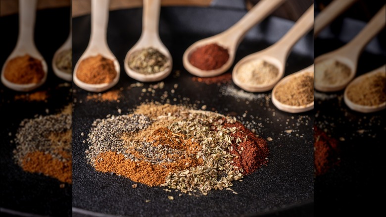 spice varieties on black dish