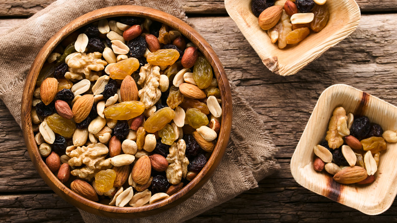 Bowls of trail mix nuts dried fruit