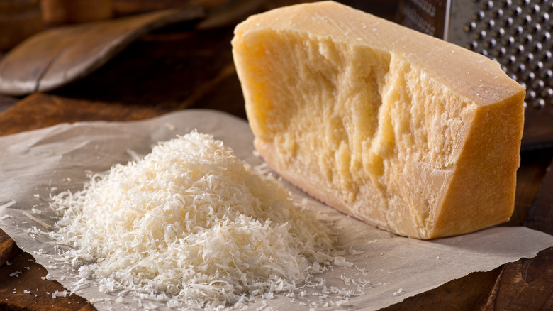 grated block of parmigiano reggiano cheese